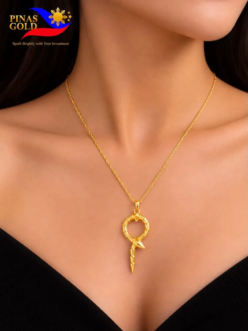 Pinas Gold snake pendant necklace in gold